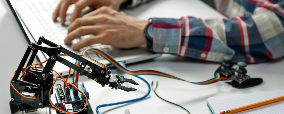 engineer working on robotics automation project