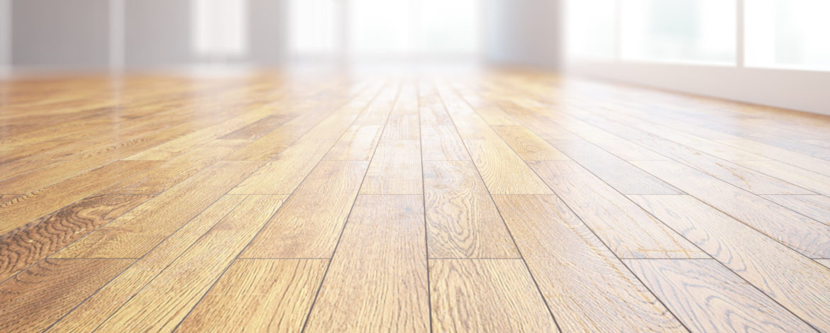 Closeup of light wooden floor in bright room interior. 3D Rendering