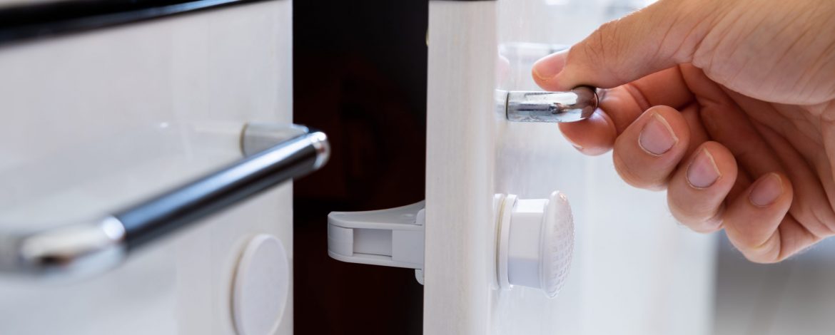 Man Opening Child Proof Kitchen Cabinets