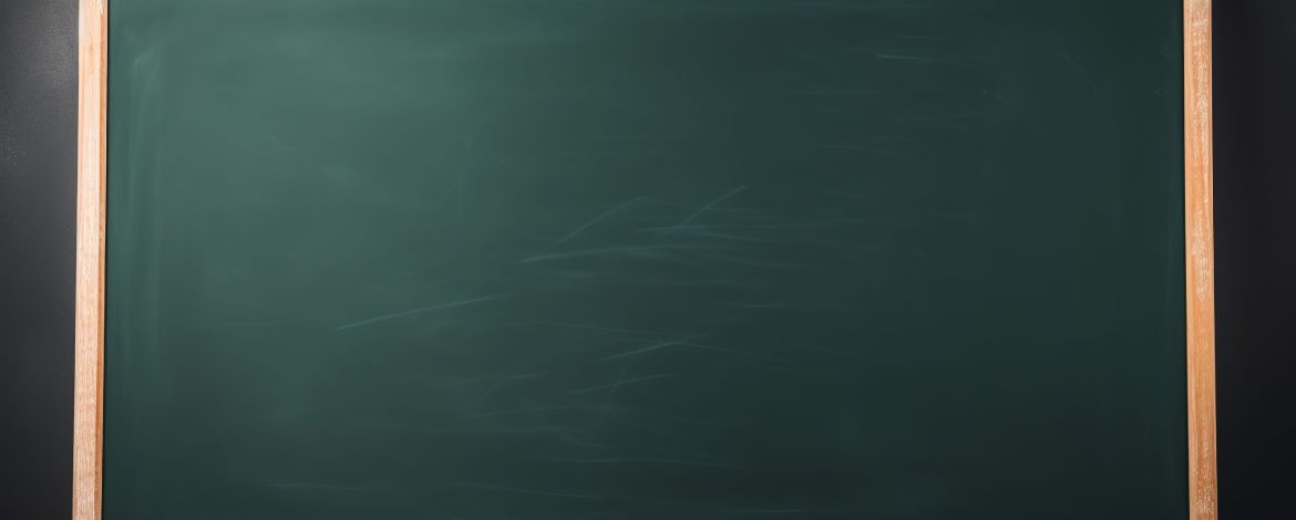 Empty blackboard in front of classroom with chalkboard eraser Background for displaying or editing products.